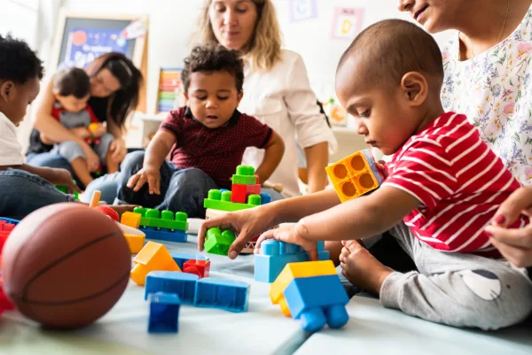 Baby playing in early learning activities, cognitive development, age appropriate, Indiana Resources
